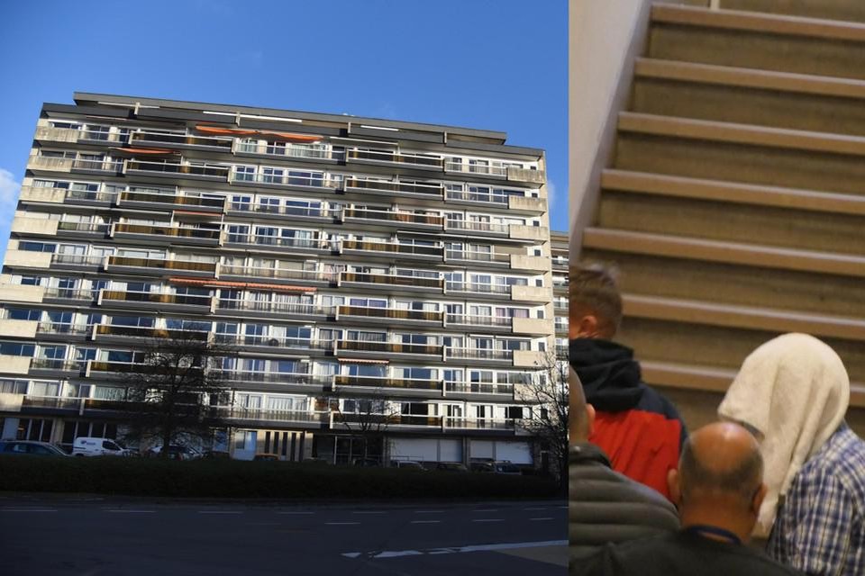 De 32-jarige man (met handdoek op het hoofd) zou een 65-jarige vrouw urenlang misbruikt hebben in haar appartement. 