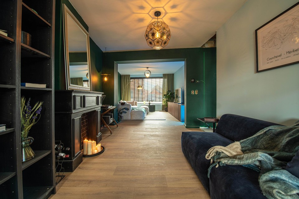 The living room after the renovations, including a completely redesigned fireplace. 