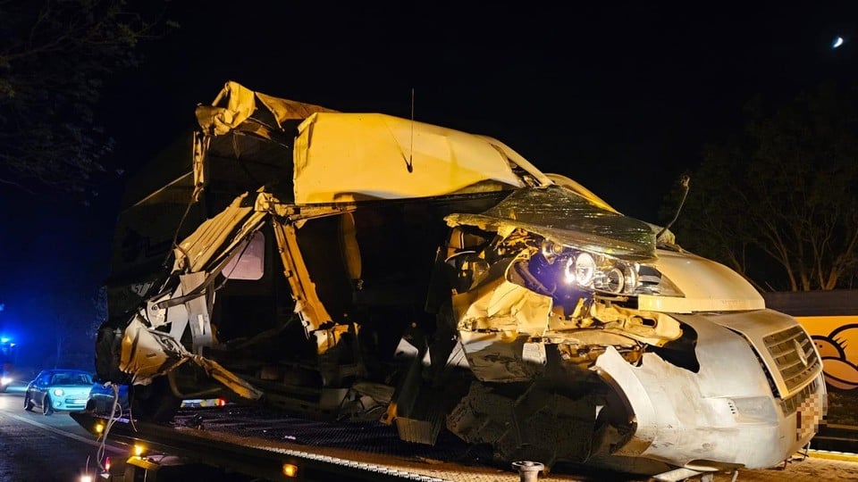 The delivery van was totally raked after the crash.