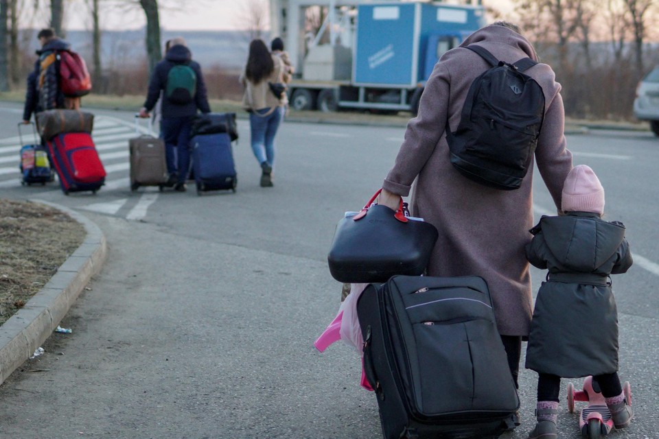 Oekraïense vluchtelingen aan de grens met Roemenië 