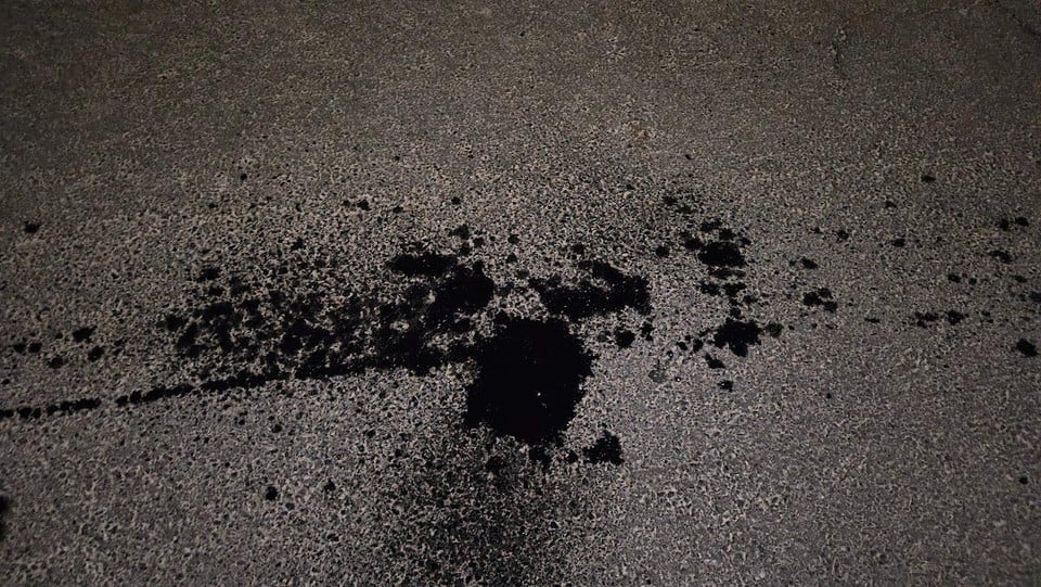 In the neighborhood, oil was found on the road surface.