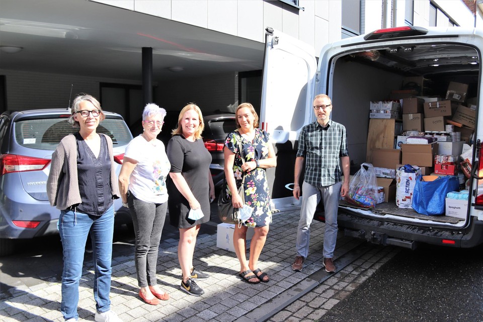 Het Mechels team van vrijwilligers met in het midden Marijke Lamon.