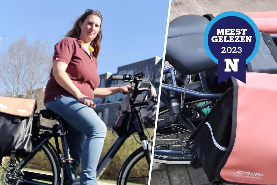 Zorgkundige Sarah De Rocker (40) en haar elektrische fiets van Oxford Cambridge met de opvallend rood-roze fietszakken van i-mens.