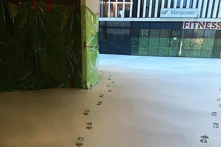 The footprints are left by a woman.