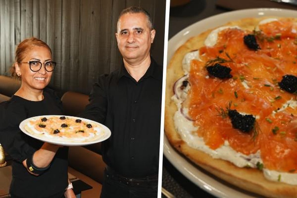 Haron Eshaghzey (54) en Maniga Aidimohamad met hun kaviaar pizza (55)