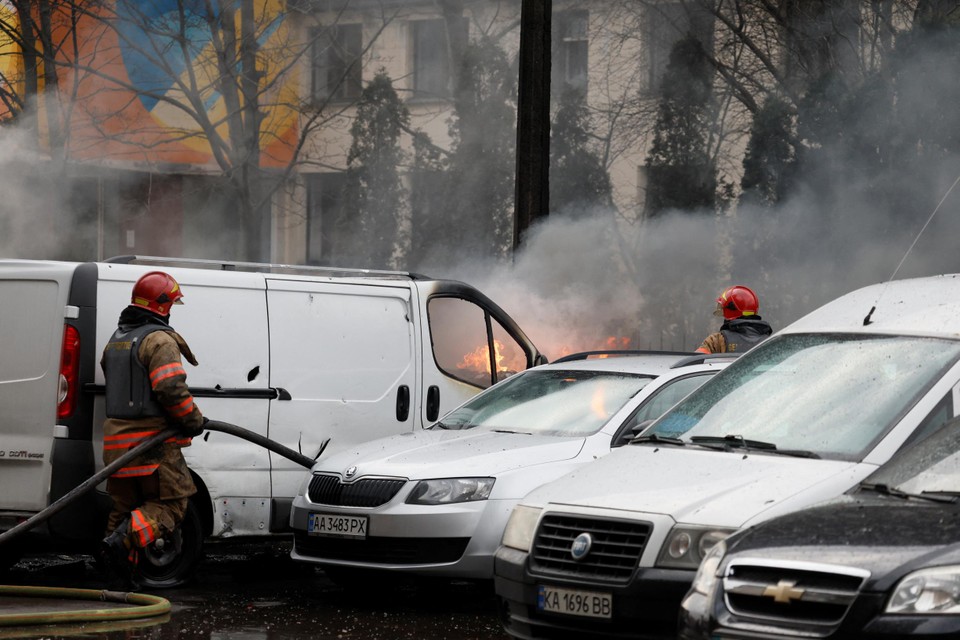 Kiev firefighters extinguish blazes after several explosions in the capital.