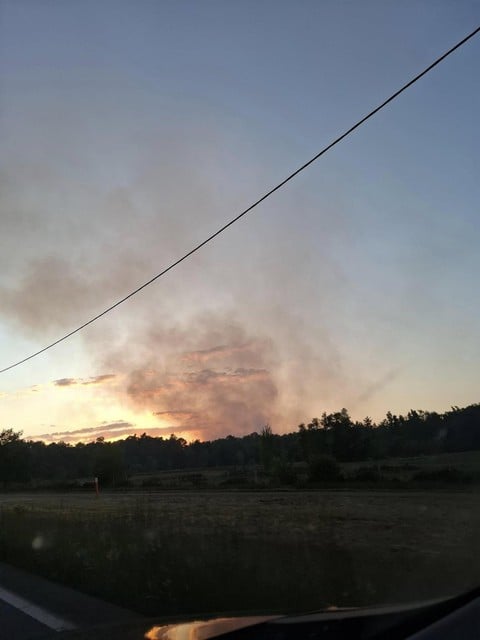 The plume of smoke can be seen from very far.