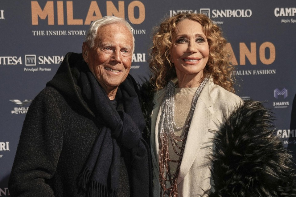 Giorgio Armani con l'attrice e modella Marisa Berenson