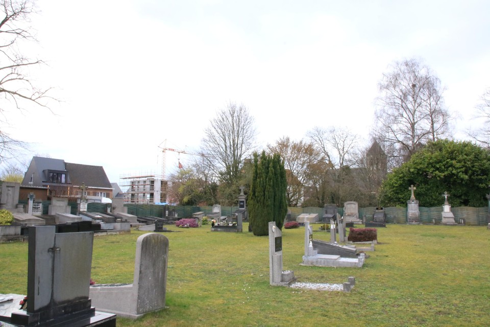 The old cemetery has become a rest area with walking paths and many additional trees