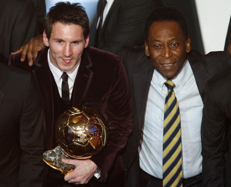 Messi met Pelé at several award ceremonies.  Here he poses with the 2011 Ballon d'Or together with the Brazilian football legend.    