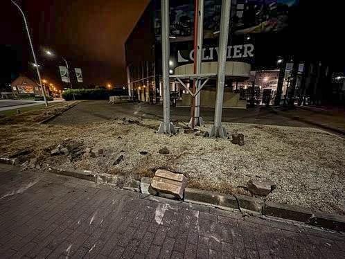 Possibly the car also hit the posts of a large advertising panel.